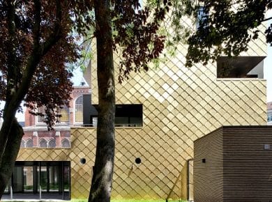 FP Architecture - Zicht vanuit de tuin op het Wijkhuis. Photo ©Filip Dujardin